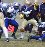 Donavon Evans eyes Carroll fumble and makes recovery in second half.